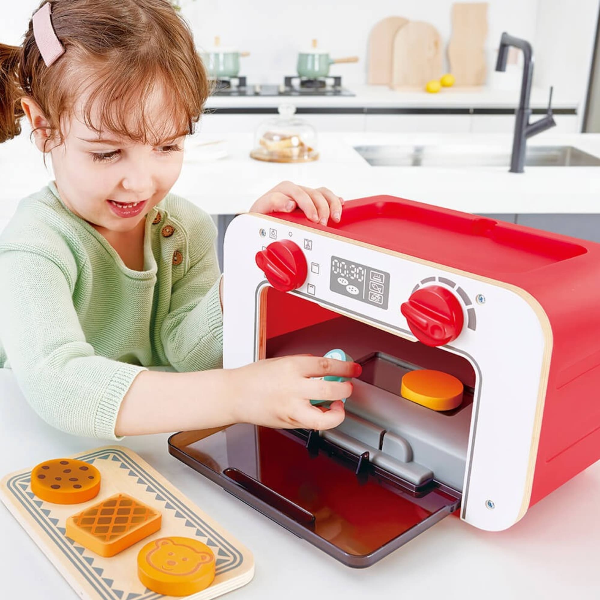 Brinquedo de Cozinha Forninho Mágico c/ Som, Luz e 6 biscoitos mágicos Hape Xalingo - 67609